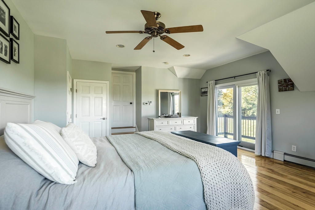 50 Jeffrey's Neck Road Ipswich, MA 01938 - Photo 30 of 41 a bedroom with a bed and window