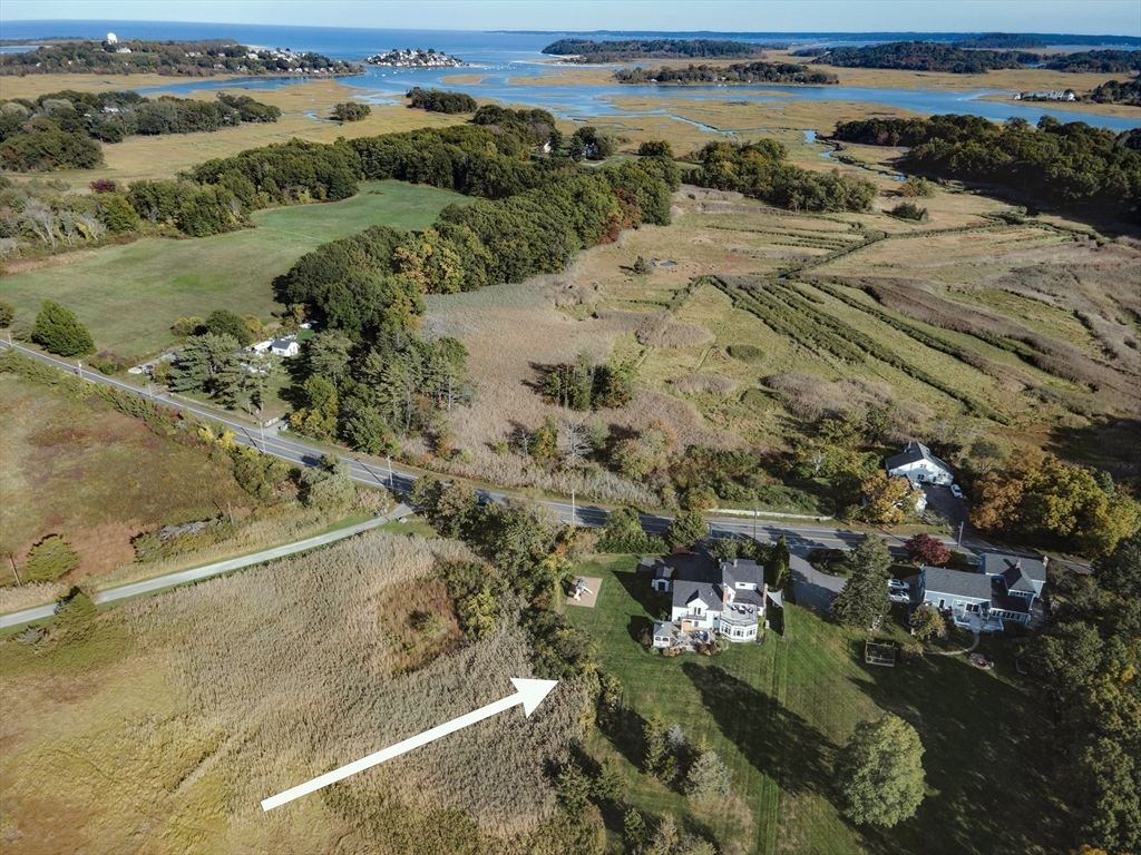 50 Jeffrey's Neck Road Ipswich, MA 01938 - Photo 41 of 41 an aerial view of ocean beach and residential houses with outdoor space