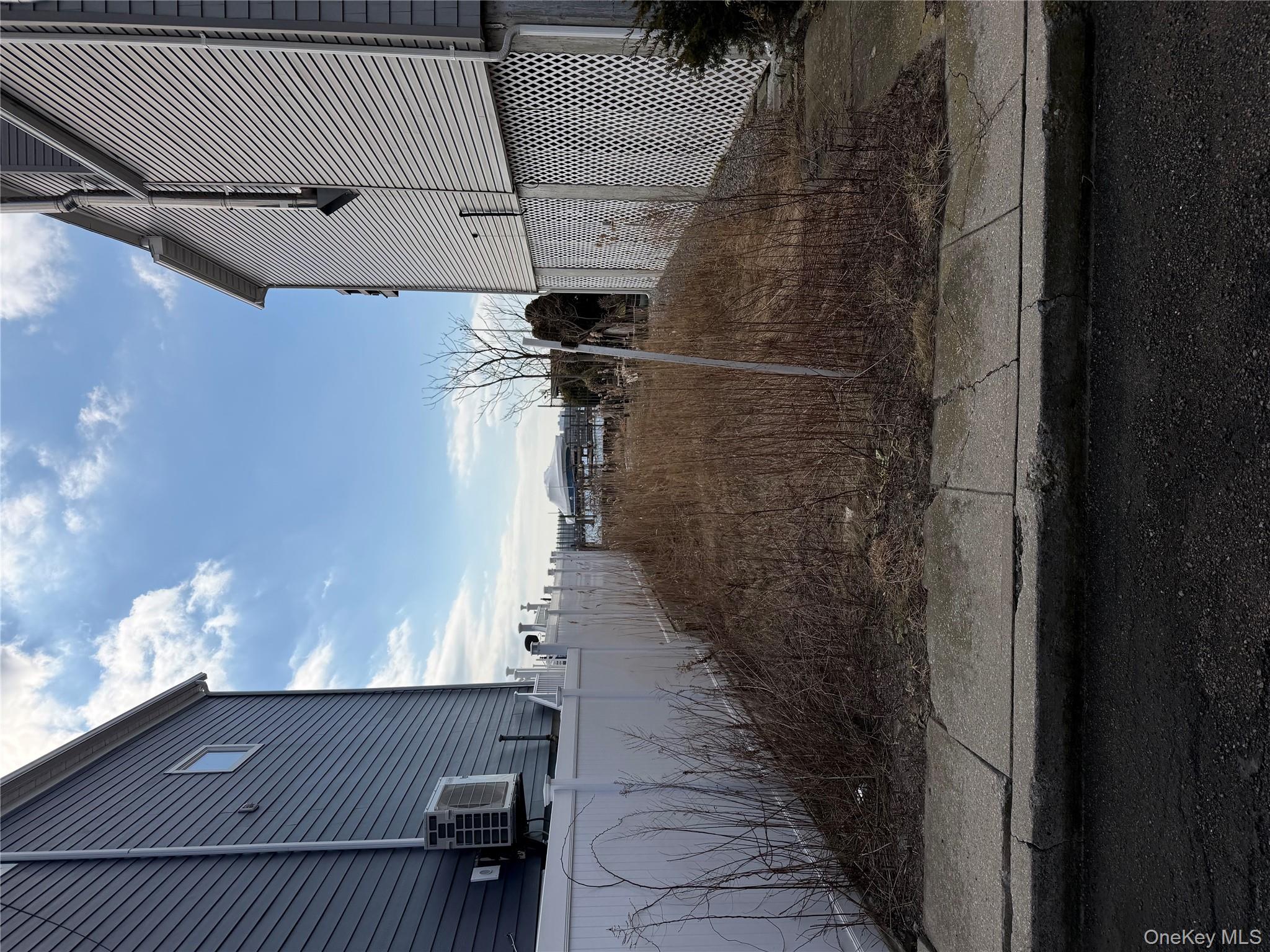 308 East 8th Road Queens, NY 11693 - Photo 2 of 7 a view of a back yard