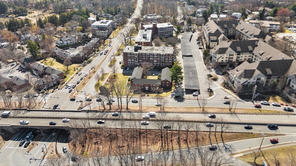 130 Boylston Street, Unit 3 Newton, MA 02467 - Photo 21 of 24 a view of building along with street