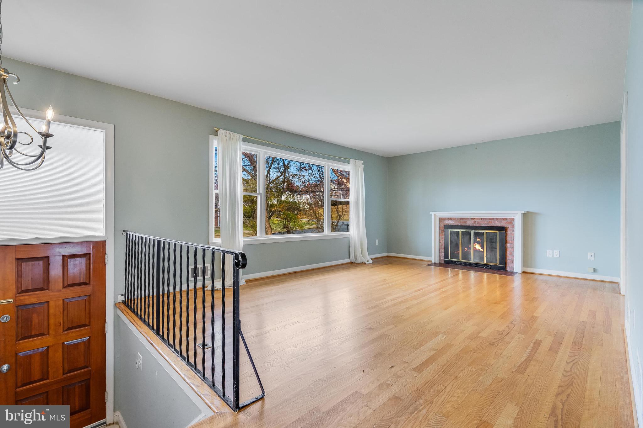 6503 Machodoc Court Falls Church, VA 22043 - Photo 4 of 34 wooden floor in a hall with an entryway