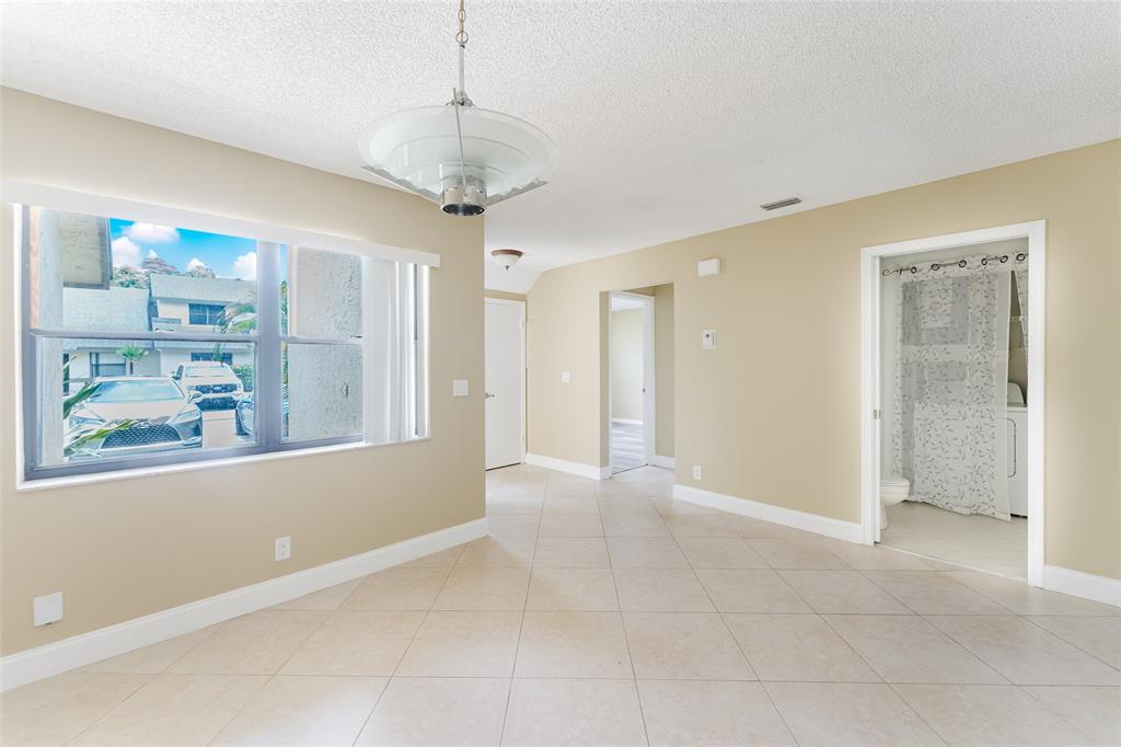 Undisclosed Address Boca Raton, FL 33428 - Photo 18 of 36 a view of livingroom with window