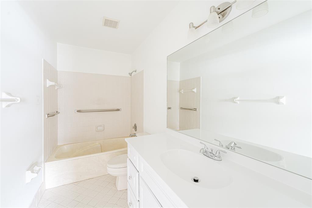 Undisclosed Address Boca Raton, FL 33428 - Photo 26 of 36 a bathroom with a sink a toilet and shower