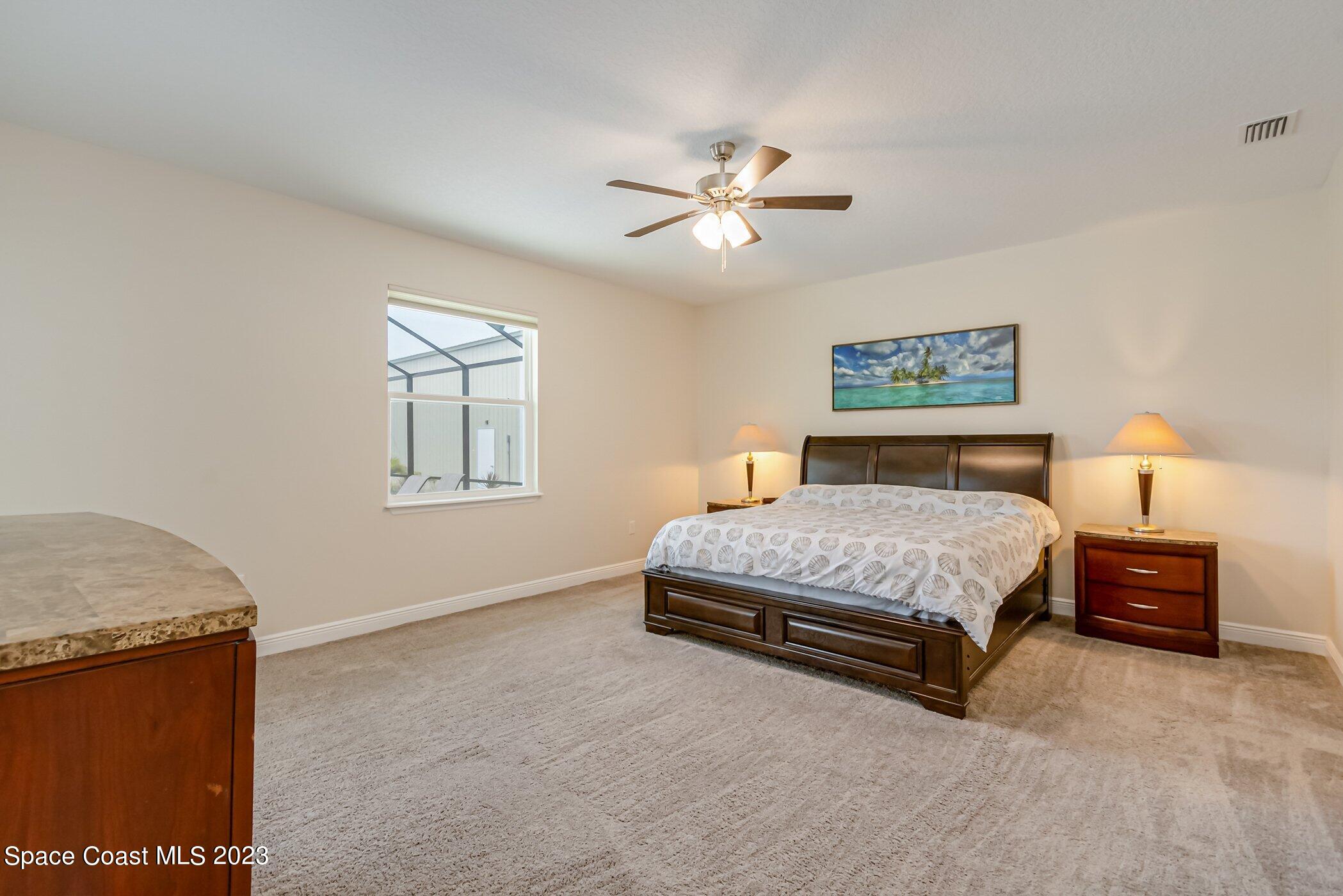 235 Deer Run Road Palm Bay, FL 32909 - Photo 14 of 49 235-Deer-Run primary bedroom