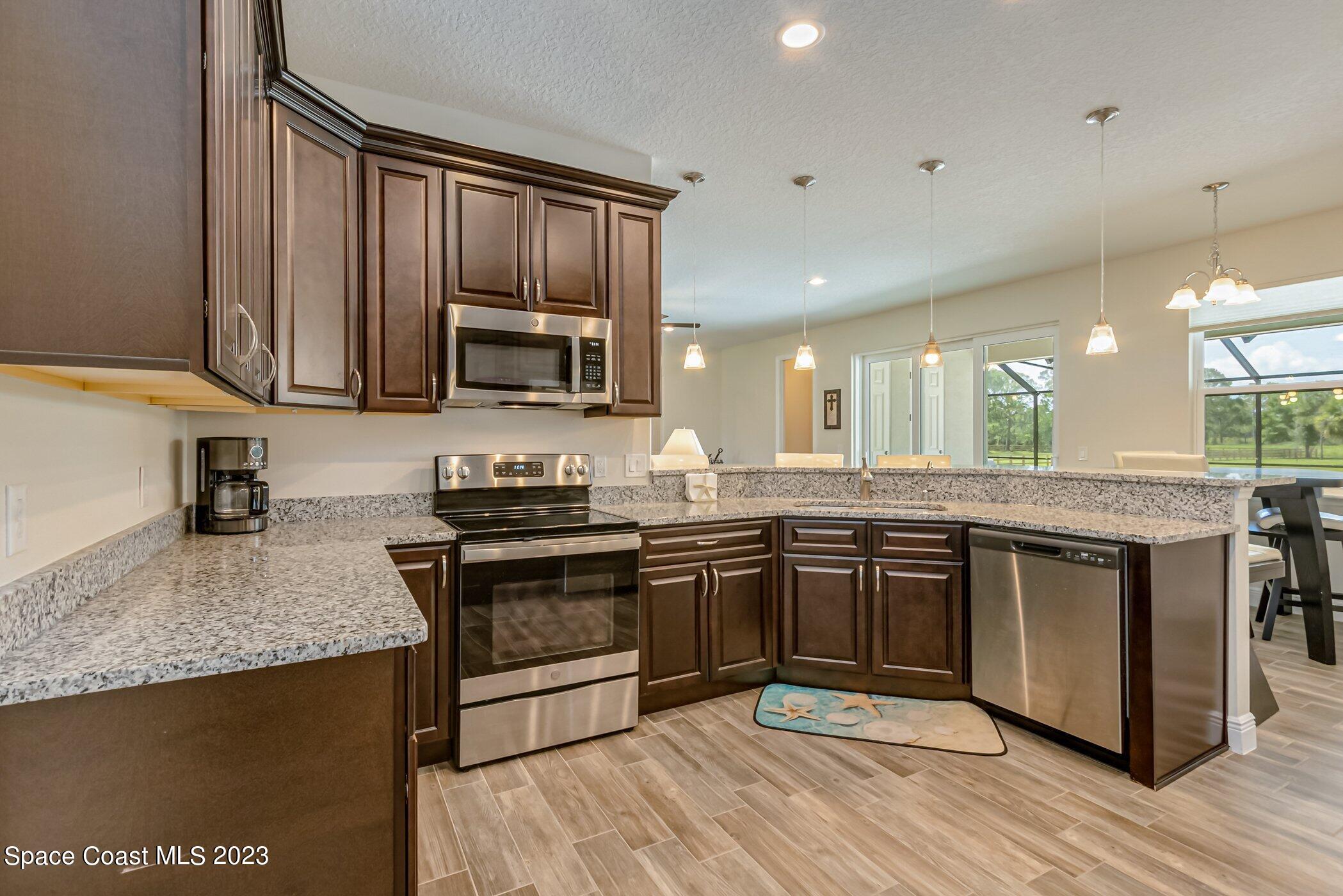 235 Deer Run Road Palm Bay, FL 32909 - Photo 3 of 49 235-Deer-Run kitchen L