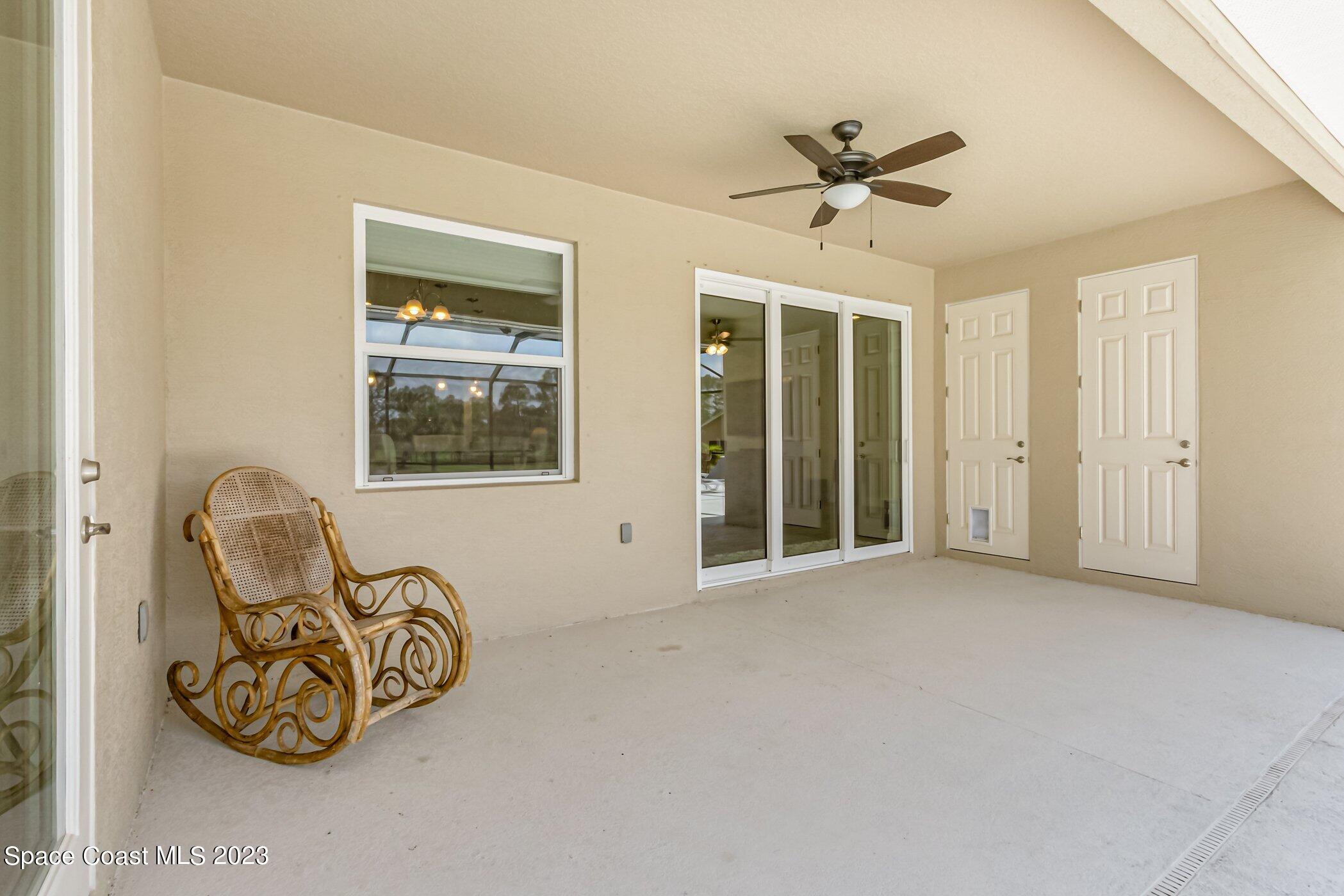235 Deer Run Road Palm Bay, FL 32909 - Photo 32 of 49 235-Deer-Run-pool dining area - Copy