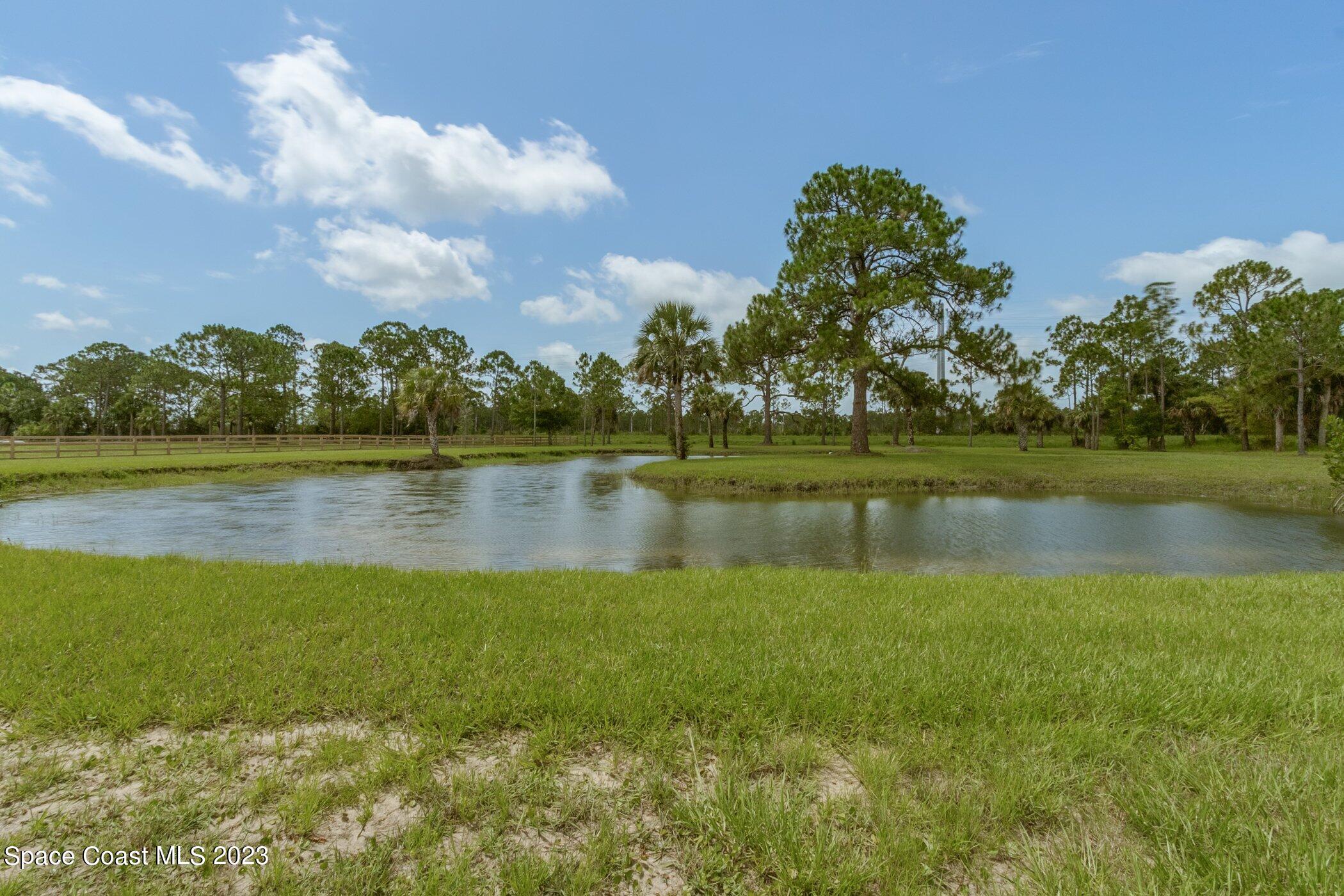 235 Deer Run Road Palm Bay, FL 32909 - Photo 35 of 49 235-Deer-Run-112.jpg-SMALL pond - Copy