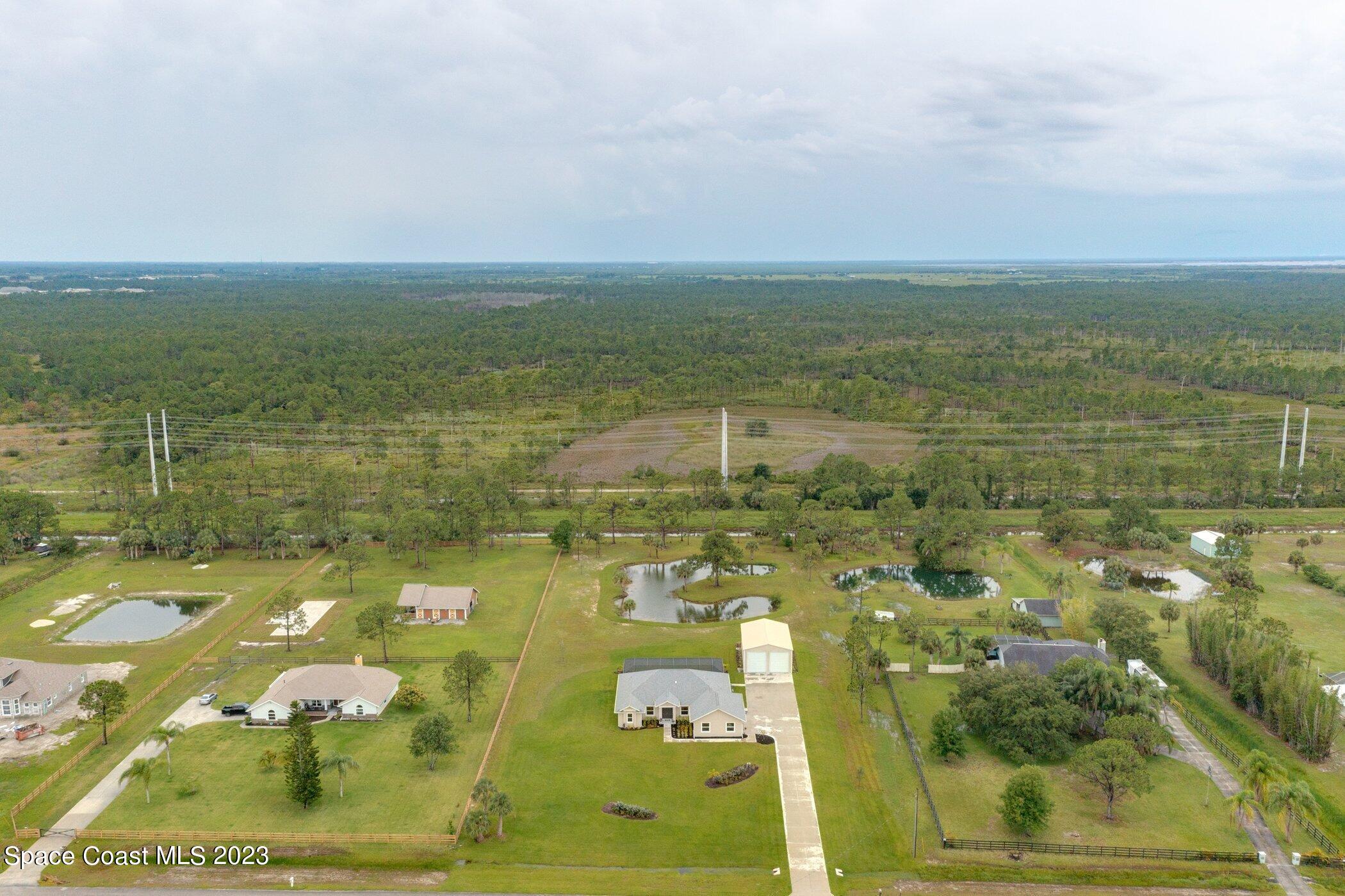 235 Deer Run Road Palm Bay, FL 32909 - Photo 41 of 49 235-deer-run-aerials-high center