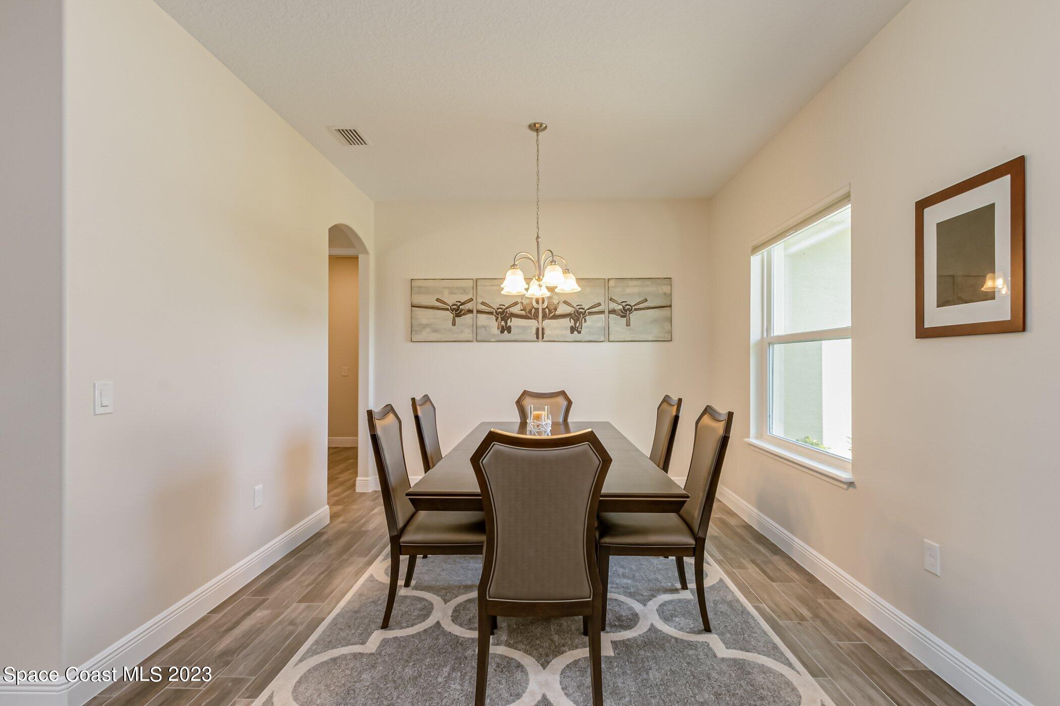 235 Deer Run Road Palm Bay, FL 32909 - Photo 8 of 49 235-Deer-Run-formal dining - Copy