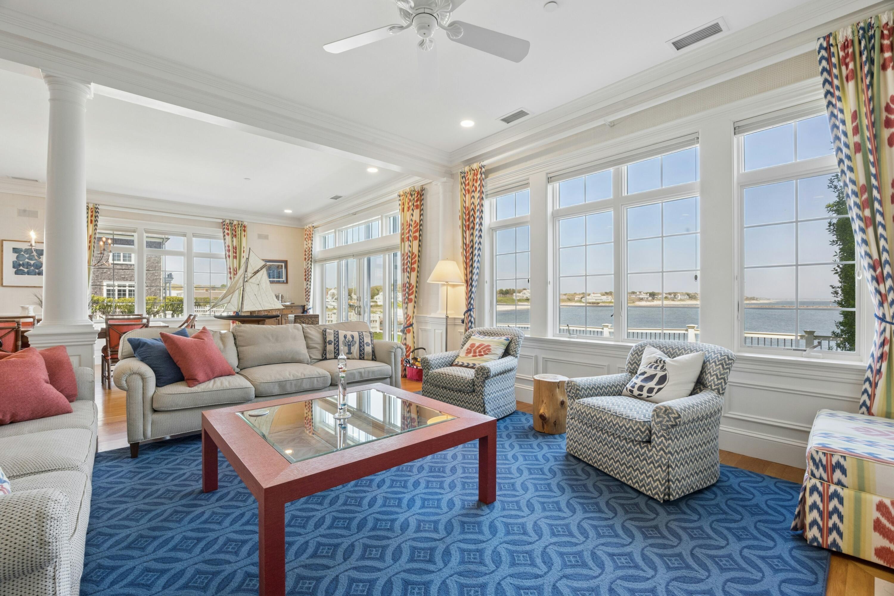23 Snow Inn Road, Unit 7 Harwich Port, MA 02646 - Photo 12 of 37 a living room with furniture and a large window