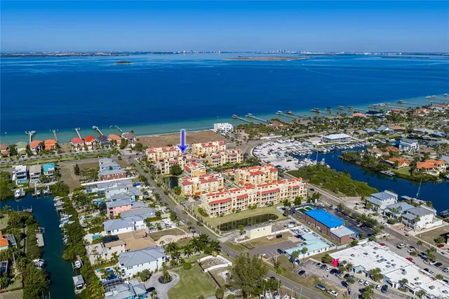 a bathroom with a sink and mirror with toilet