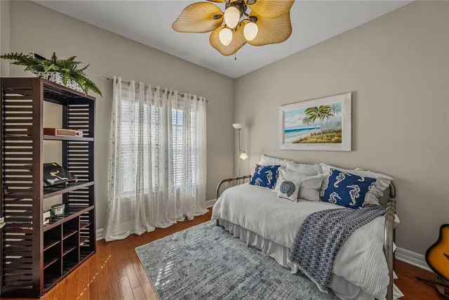a spacious bathroom with a granite countertop sink mirror and shower