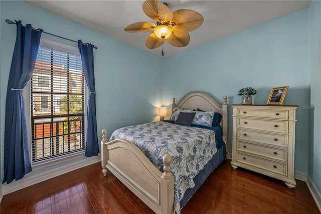 a front view of a building with glass windows and a table