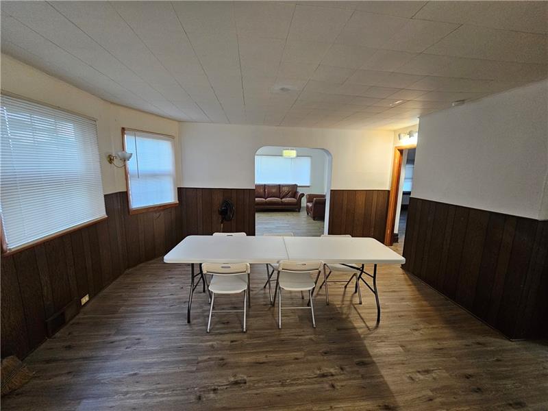 325 Adams Street Rochester, PA 15074 - Photo 3 of 14 a living room with furniture and wooden floor