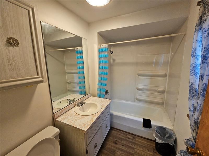 325 Adams Street Rochester, PA 15074 - Photo 7 of 14 a bathroom with a sink toilet and shower