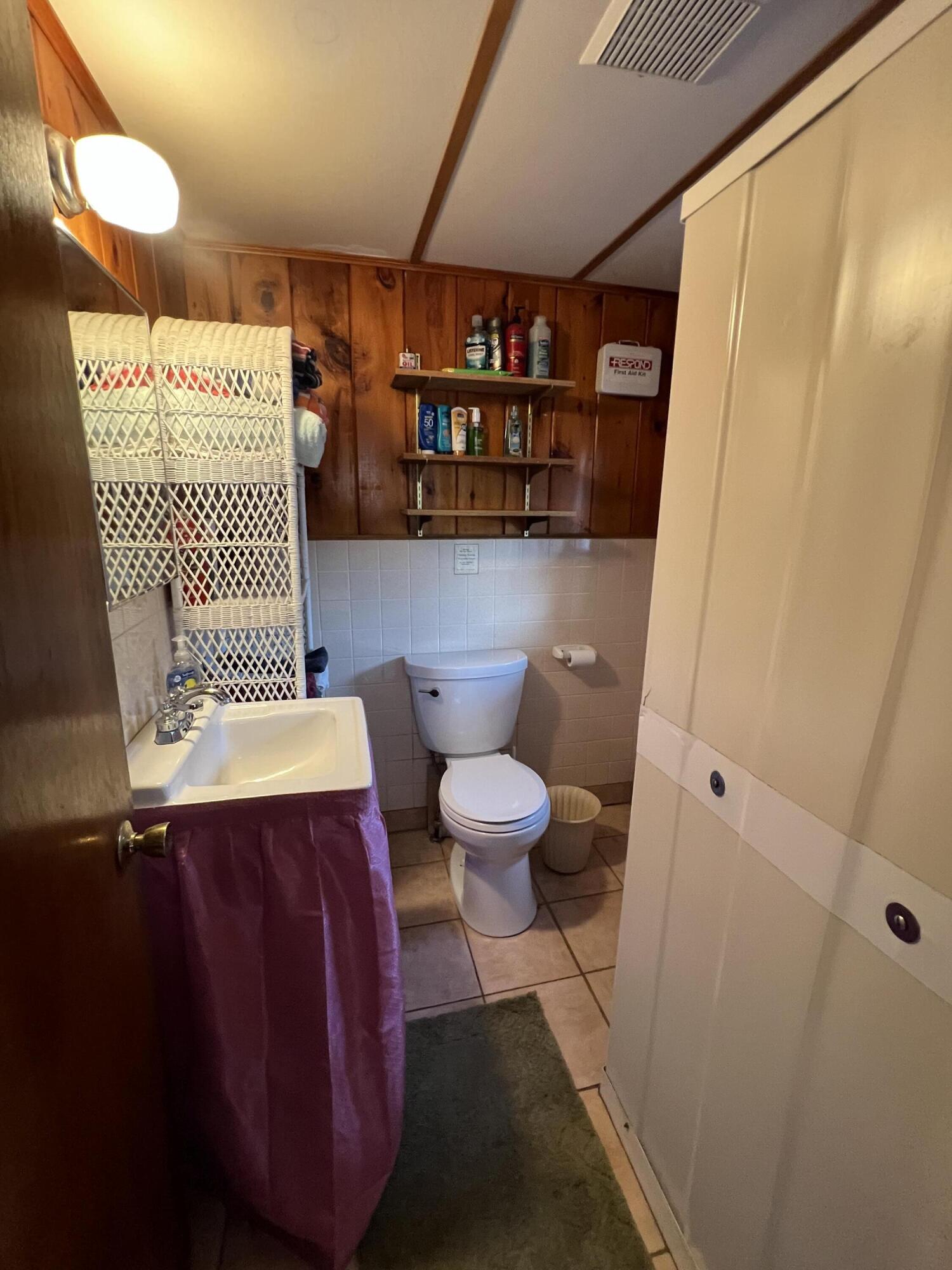 7 A Toms Path Dennis Port, MA 02639 - Photo 12 of 23 a bathroom with a toilet and a shower