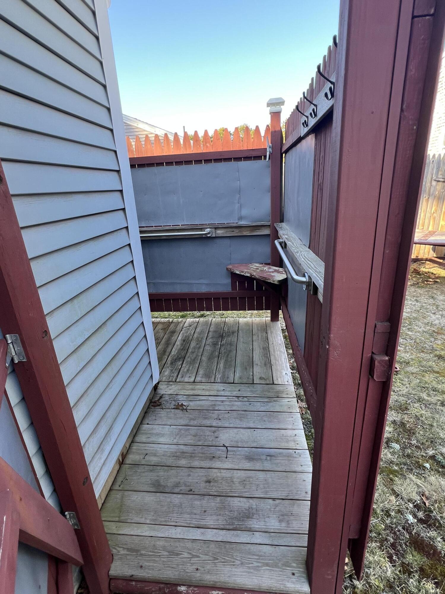 7 A Toms Path Dennis Port, MA 02639 - Photo 19 of 23 a view of balcony with wooden floor