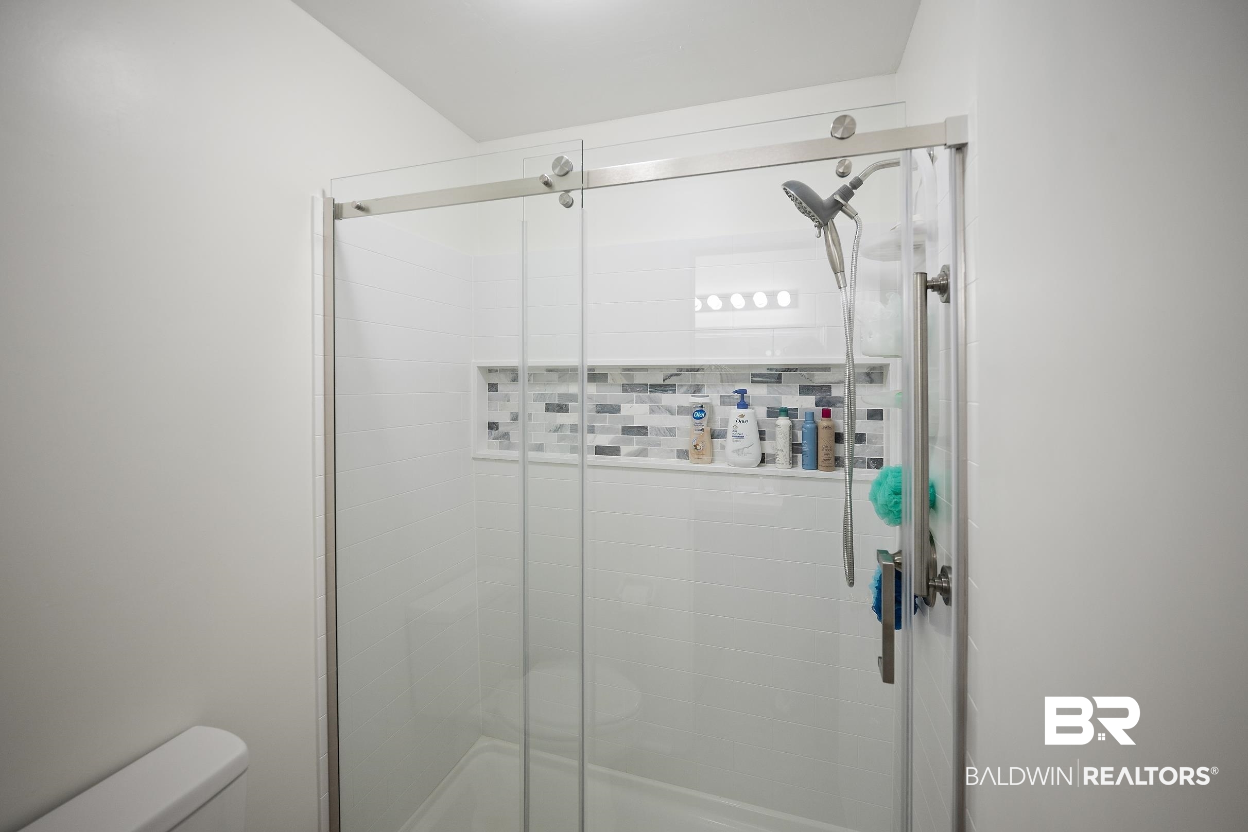 120 Dunbar Loop Daphne, AL 36526 - Photo 15 of 25 Bathroom featuring toilet and a stall shower