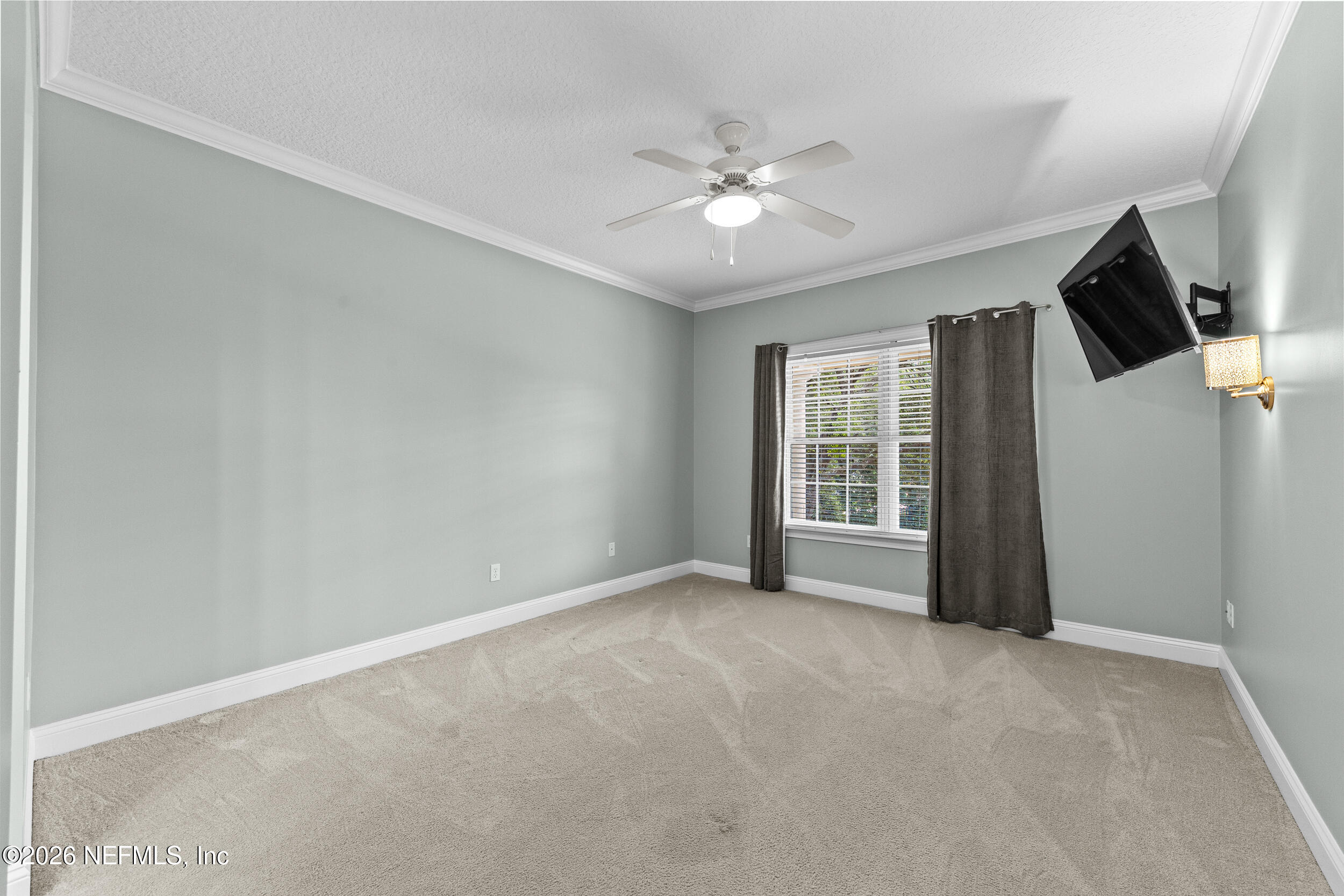 3225 Bishop Estates Road St. Johns, FL 32259 - Photo 41 of 90 a view of a livingroom with a ceiling fan and window
