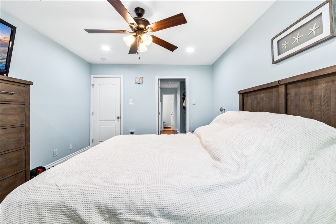 7890 East Spring Street, Unit 22F Long Beach, CA 90815 - Photo 15 of 35 a large white bed in a white room