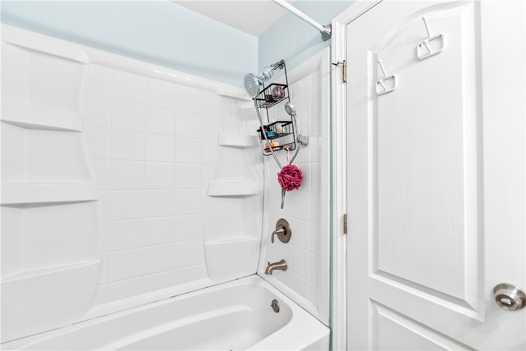 7890 East Spring Street, Unit 22F Long Beach, CA 90815 - Photo 18 of 35 a bathroom with a shower