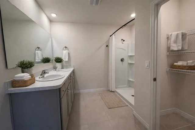 a large room with wooden floor and windows