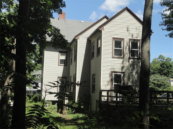 6 Eaton Street Wakefield, MA 01880 - Photo 3 of 11 a view of a house with backyard and sitting area