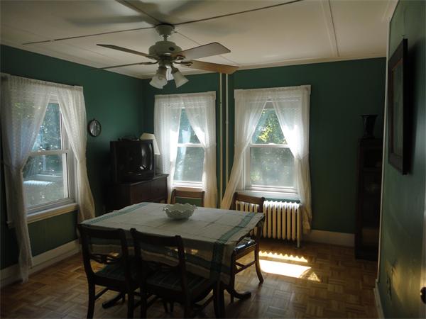 6 Eaton Street Wakefield, MA 01880 - Photo 5 of 11 a view of a dining room with furniture window and wooden floor