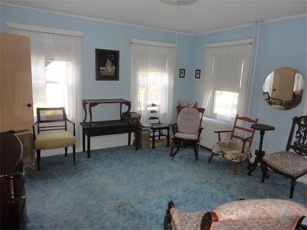 6 Eaton Street Wakefield, MA 01880 - Photo 8 of 11 a living room with furniture and a window
