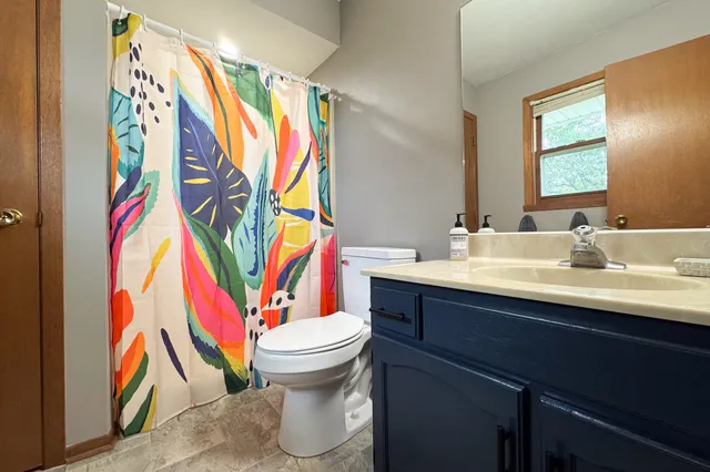 a bathroom with a sink and a toilet