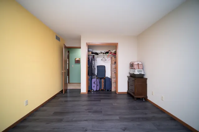 a view of a livingroom with furniture and wooden floor