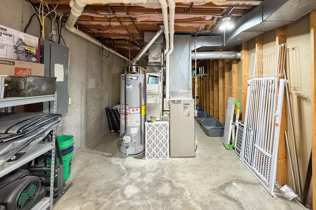 a view of a porch with wooden floor and fence
