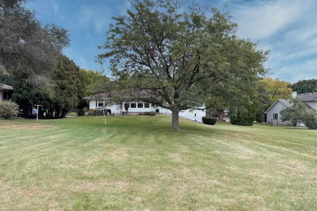 a house with trees in front of it
