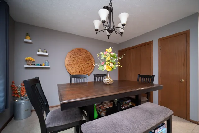 a view of a dining room with furniture