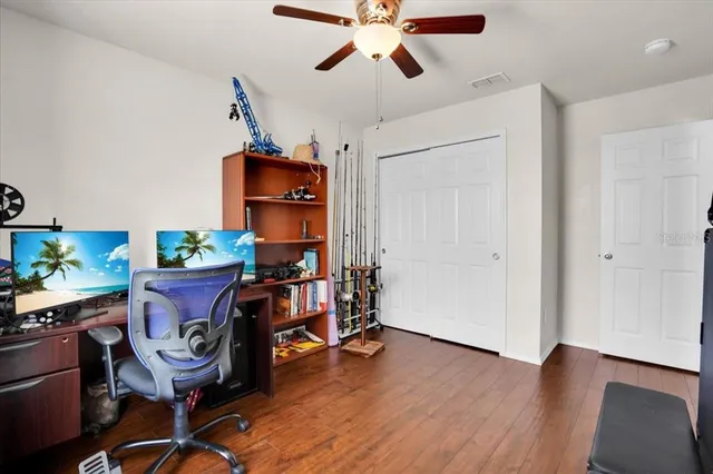 a workspace with furniture and wooden floor