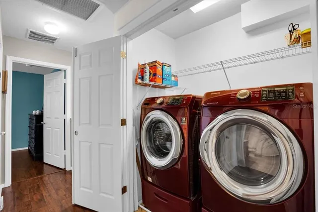 a utility room with dryer and washer