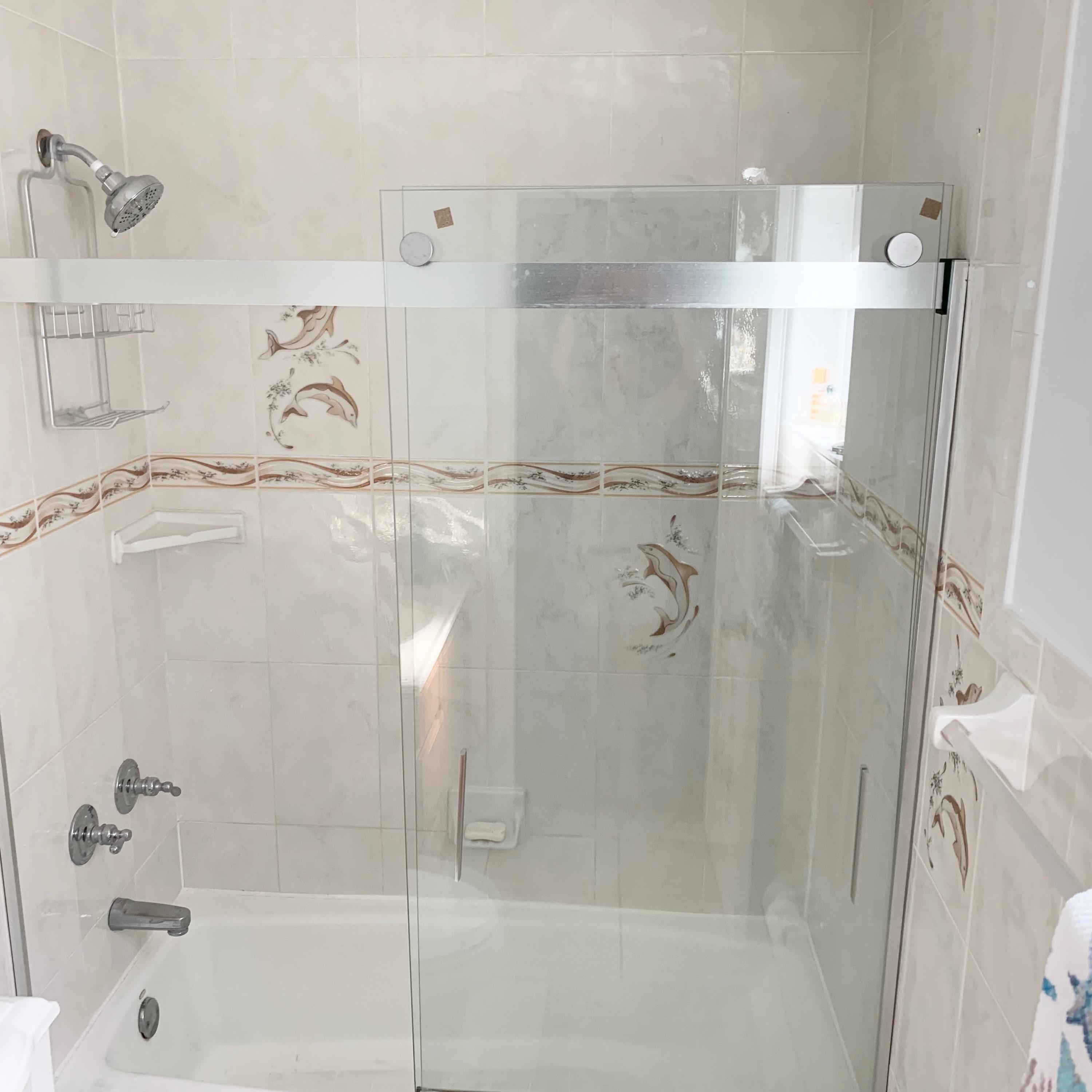 46 Snapper Avenue Key Largo, FL 33037 - Photo 15 of 26 a bathroom with a bathtub and a shower