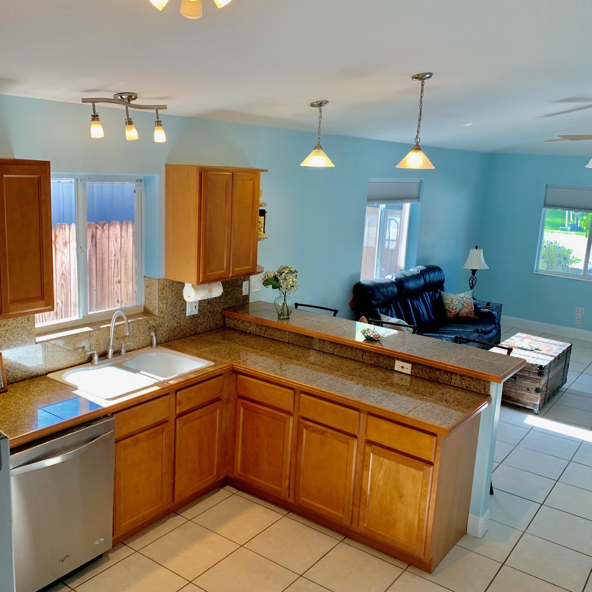 46 Snapper Avenue Key Largo, FL 33037 - Photo 4 of 26 a kitchen with a sink and cabinets