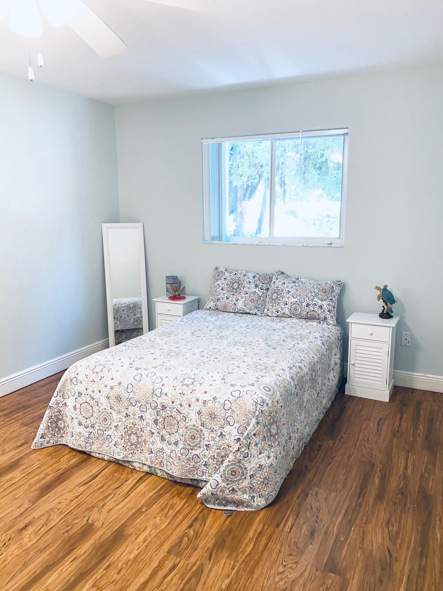 46 Snapper Avenue Key Largo, FL 33037 - Photo 9 of 26 a bedroom with a bed and a window