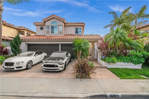 a car parked in front of a house