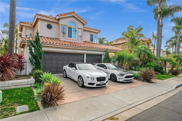a car parked in front of a house