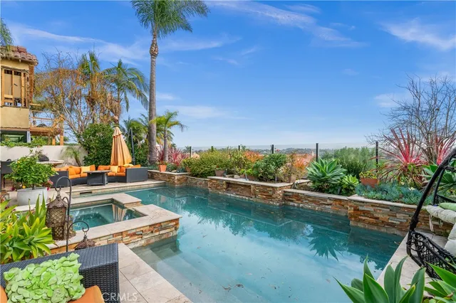a view of a lake with a house in the background