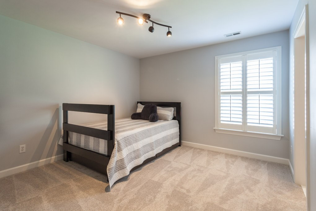 12340 Canolder Street Raleigh, NC 27614 - Photo 21 of 30 Bedroom #4 features new carpet, plantation shutters and direct access to a Jack and Jill-style bathroom. Bedroom #4