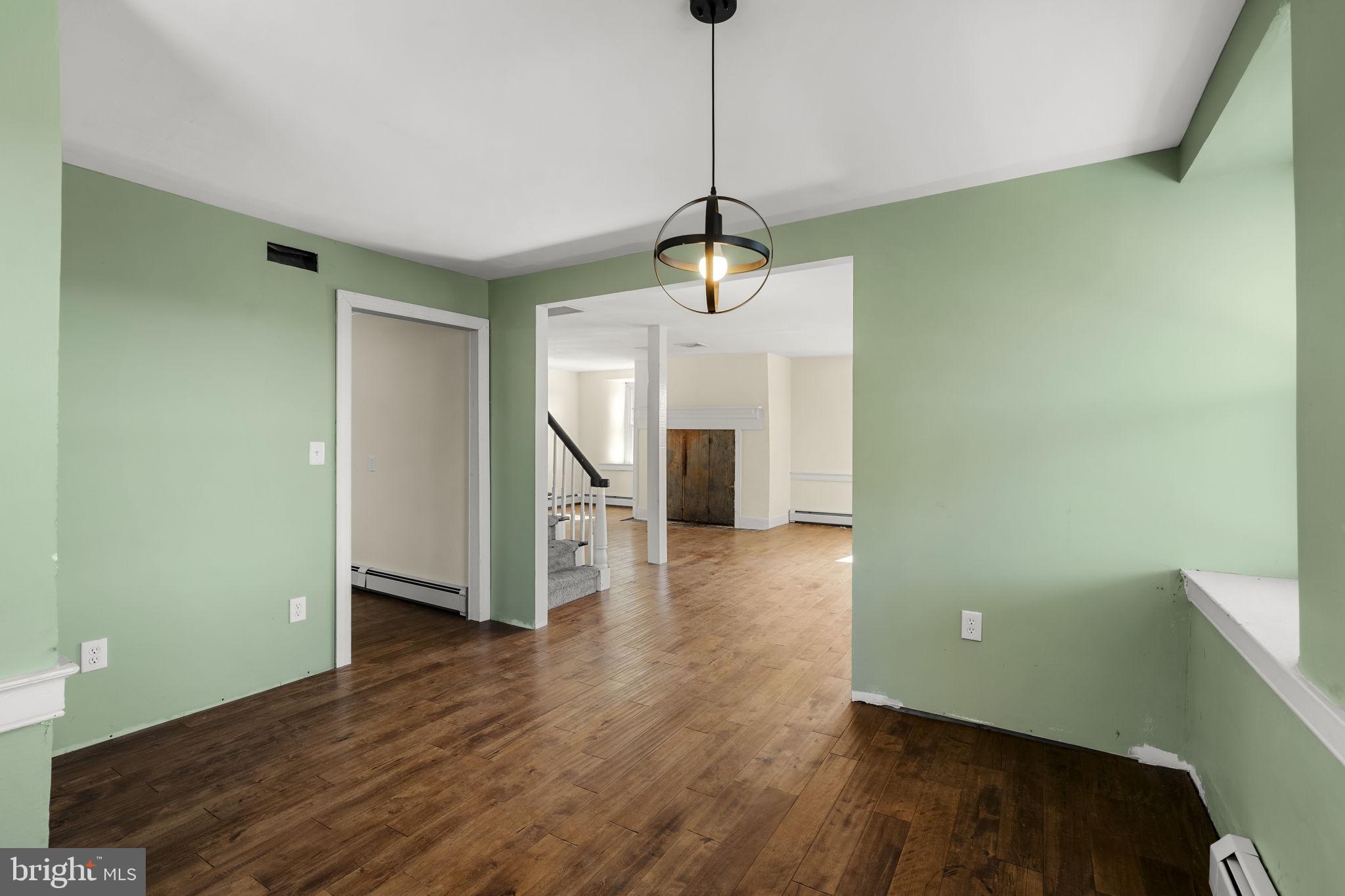 39 Gill Road Mohnton, PA 19540 - Photo 14 of 59 a view of a room with wooden floor staircase and a chandelier