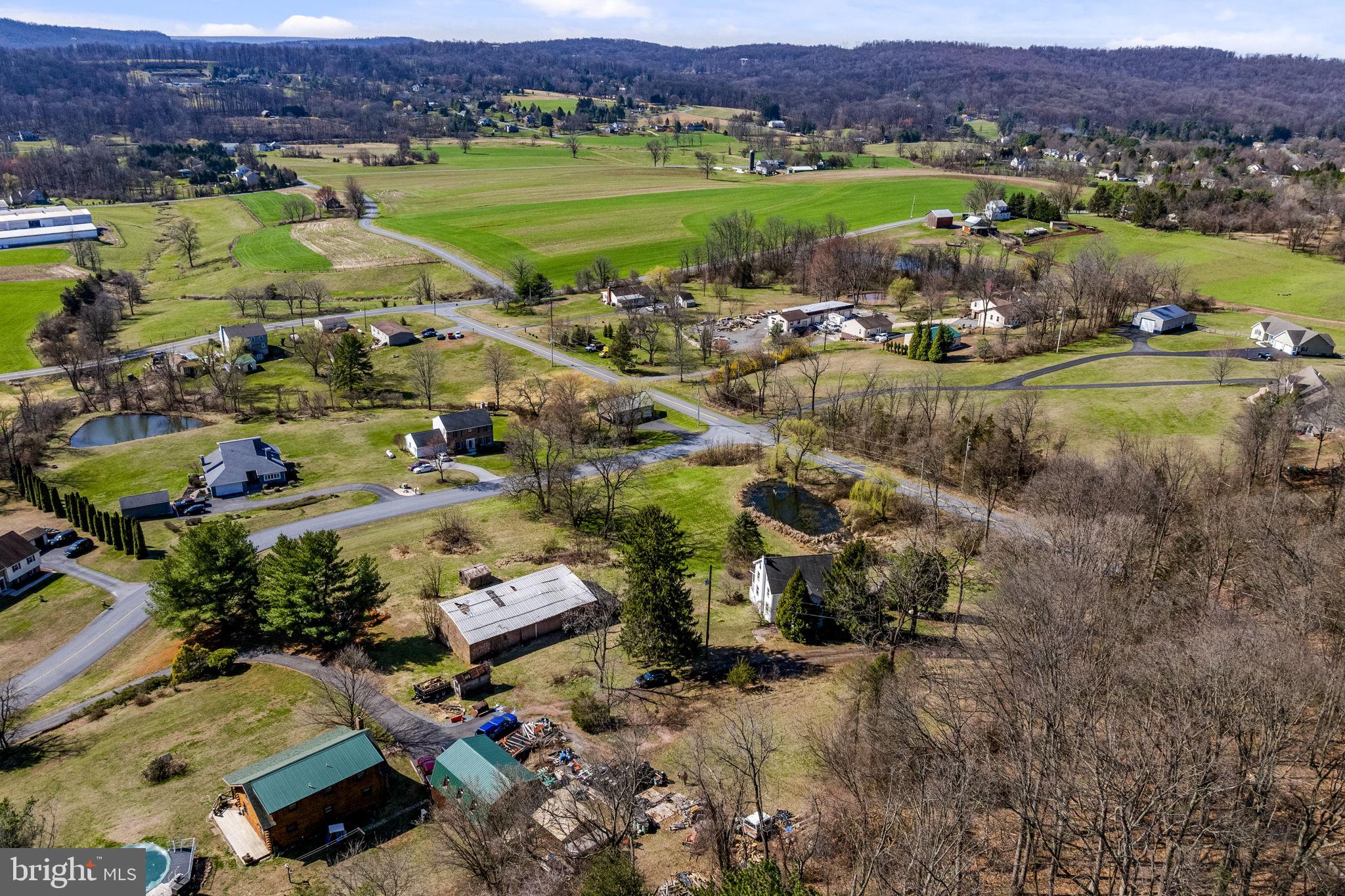 39 Gill Road Mohnton, PA 19540 - Photo 19 of 59 an aerial view of a houses with a lake view