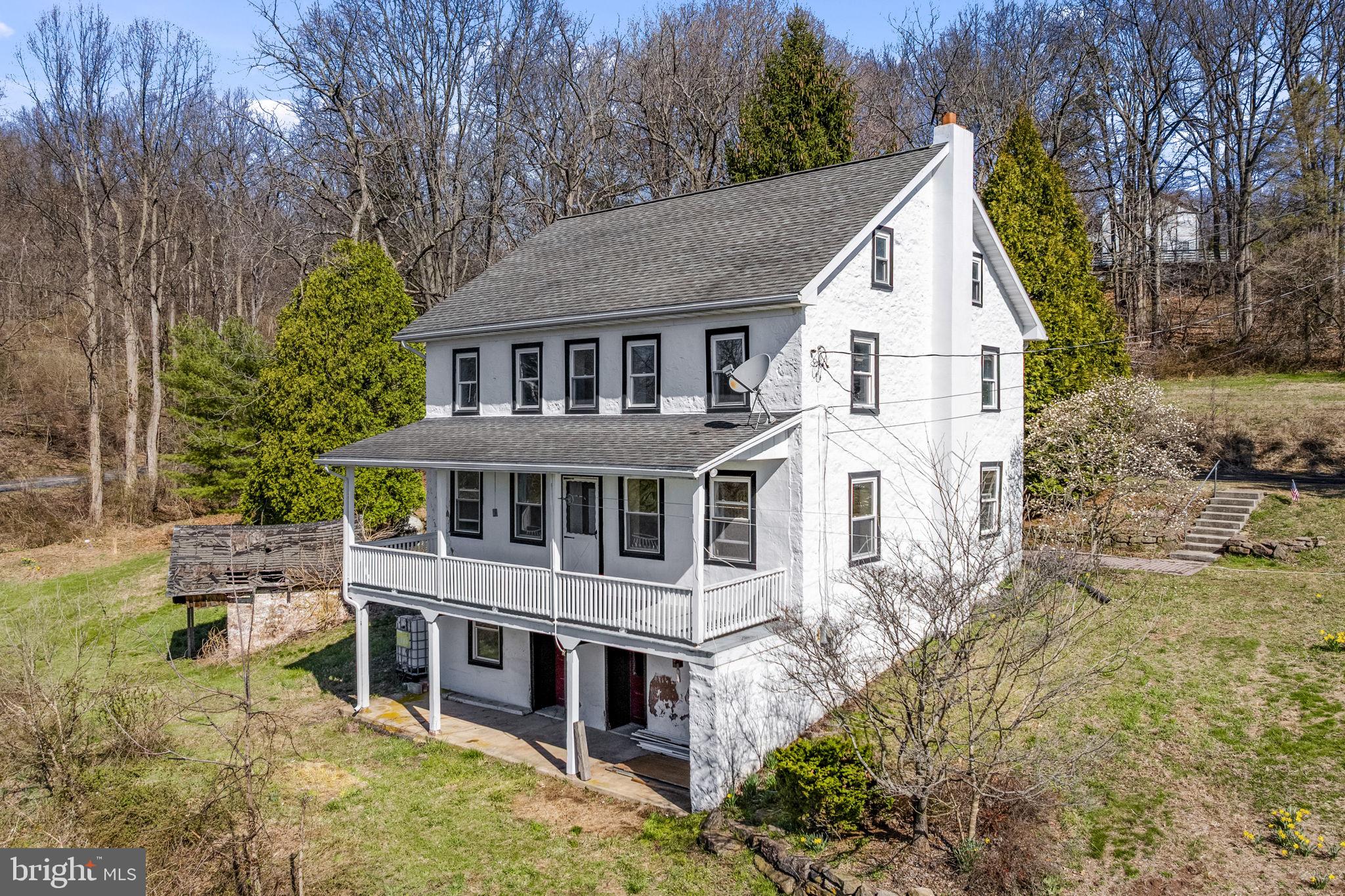 39 Gill Road Mohnton, PA 19540 - Photo 2 of 59 a view of a house with roof deck and sitting area