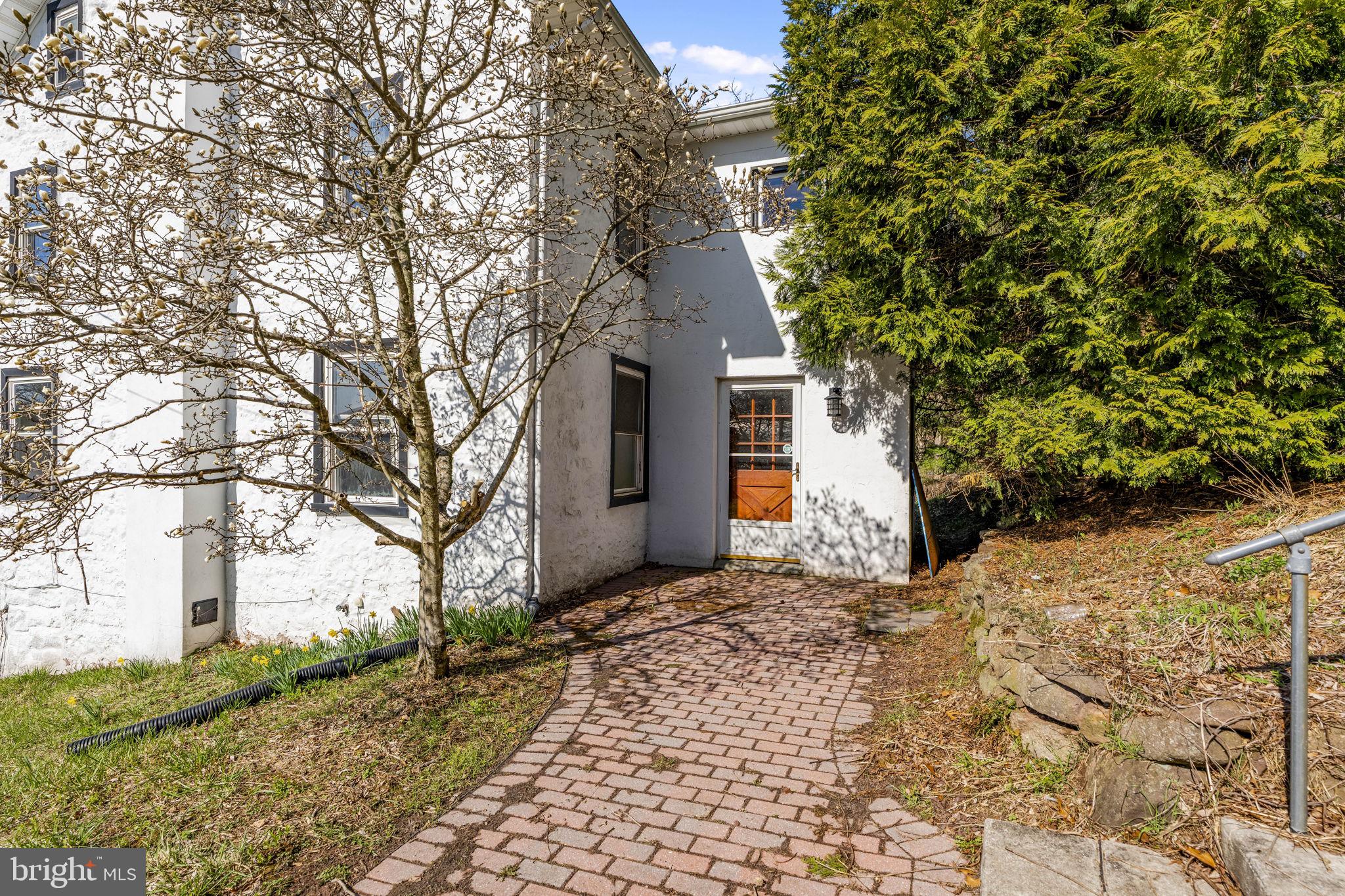 39 Gill Road Mohnton, PA 19540 - Photo 25 of 59 a front view of a house with a yard and garage