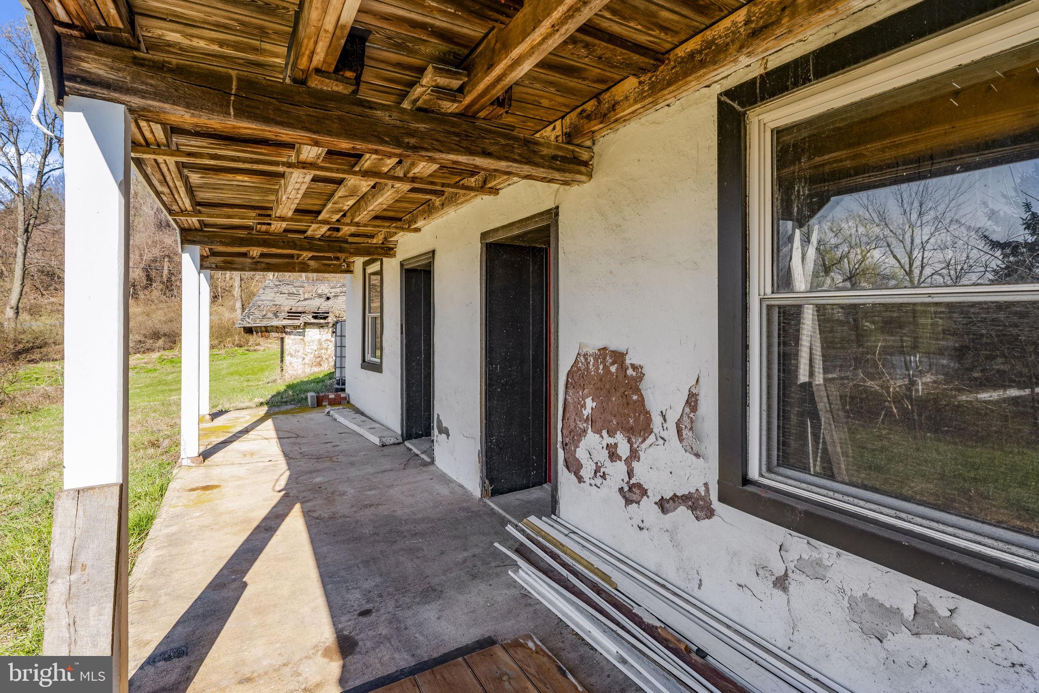 39 Gill Road Mohnton, PA 19540 - Photo 27 of 59 a living room with wooden floor and a large window