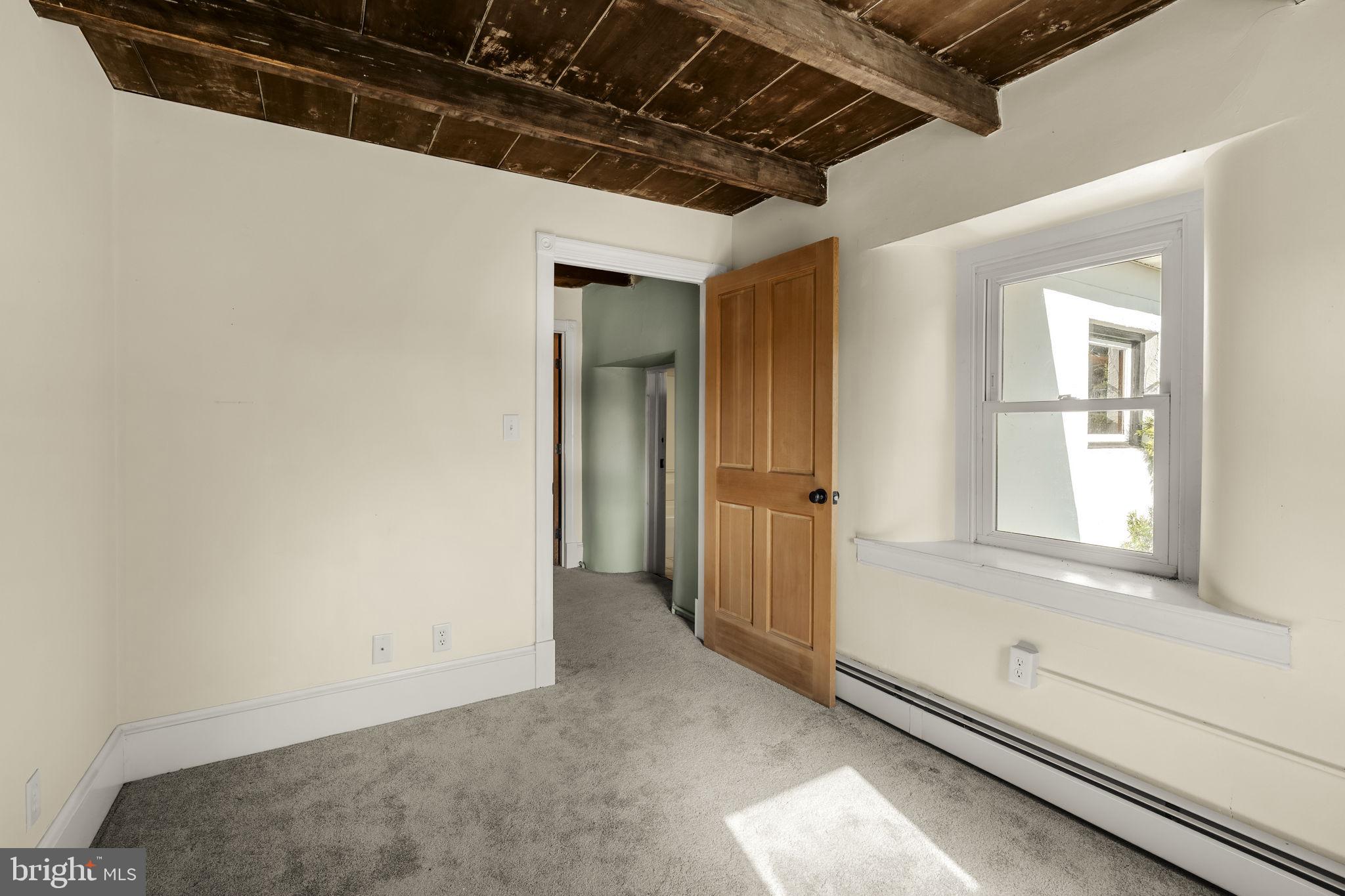 39 Gill Road Mohnton, PA 19540 - Photo 50 of 59 a view of a hallway with wooden floor and a window