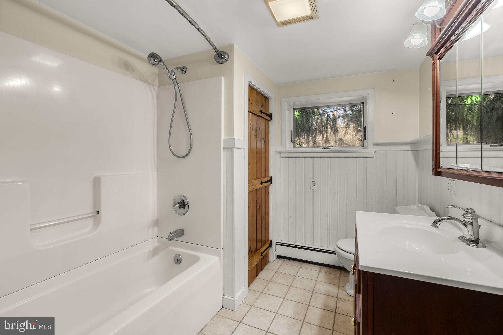 39 Gill Road Mohnton, PA 19540 - Photo 53 of 59 a bathroom with a tub sink shower and mirror